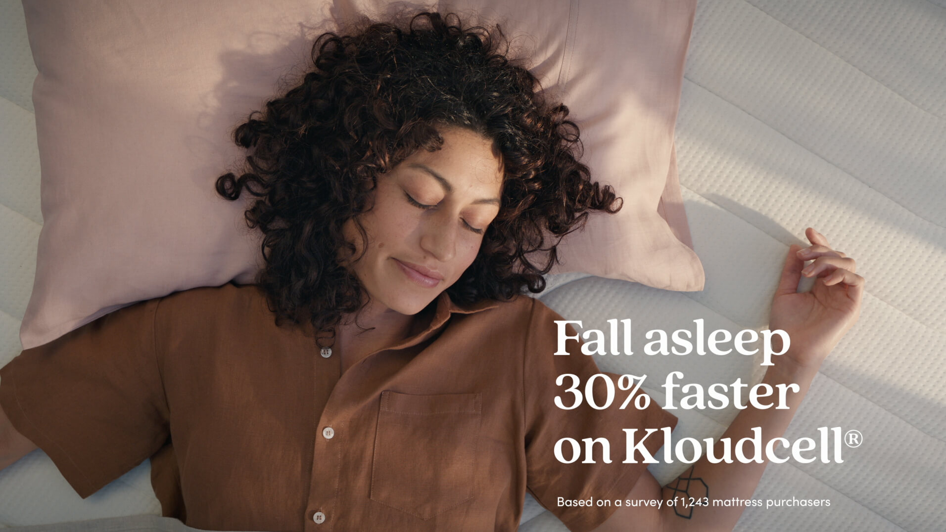 Koala Kloudcell television campaign commercial showing woman laying on bed sleeping peacefully with text saying fall asleep 30% faster on Kloudcell