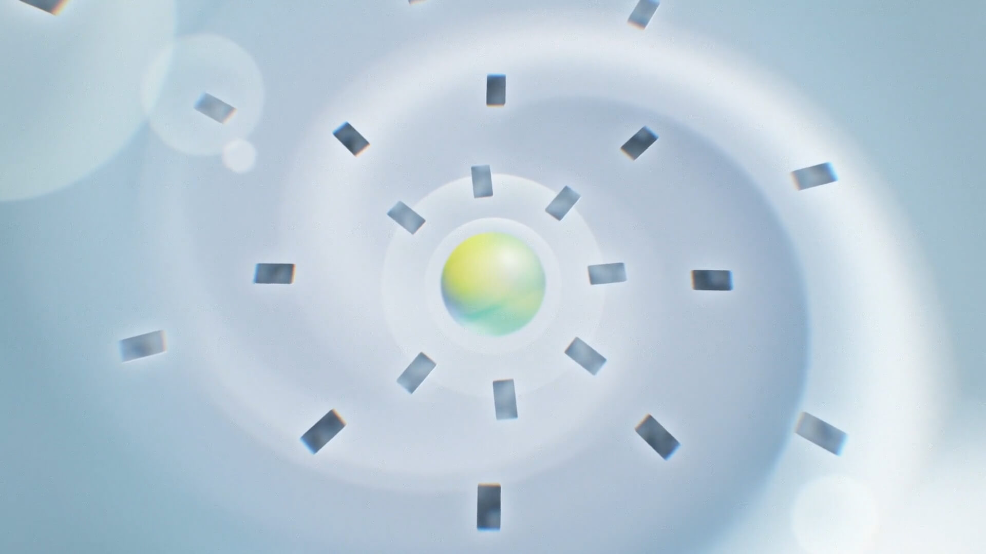 A motion graphics piece showing a grey particle explosion on a grey background