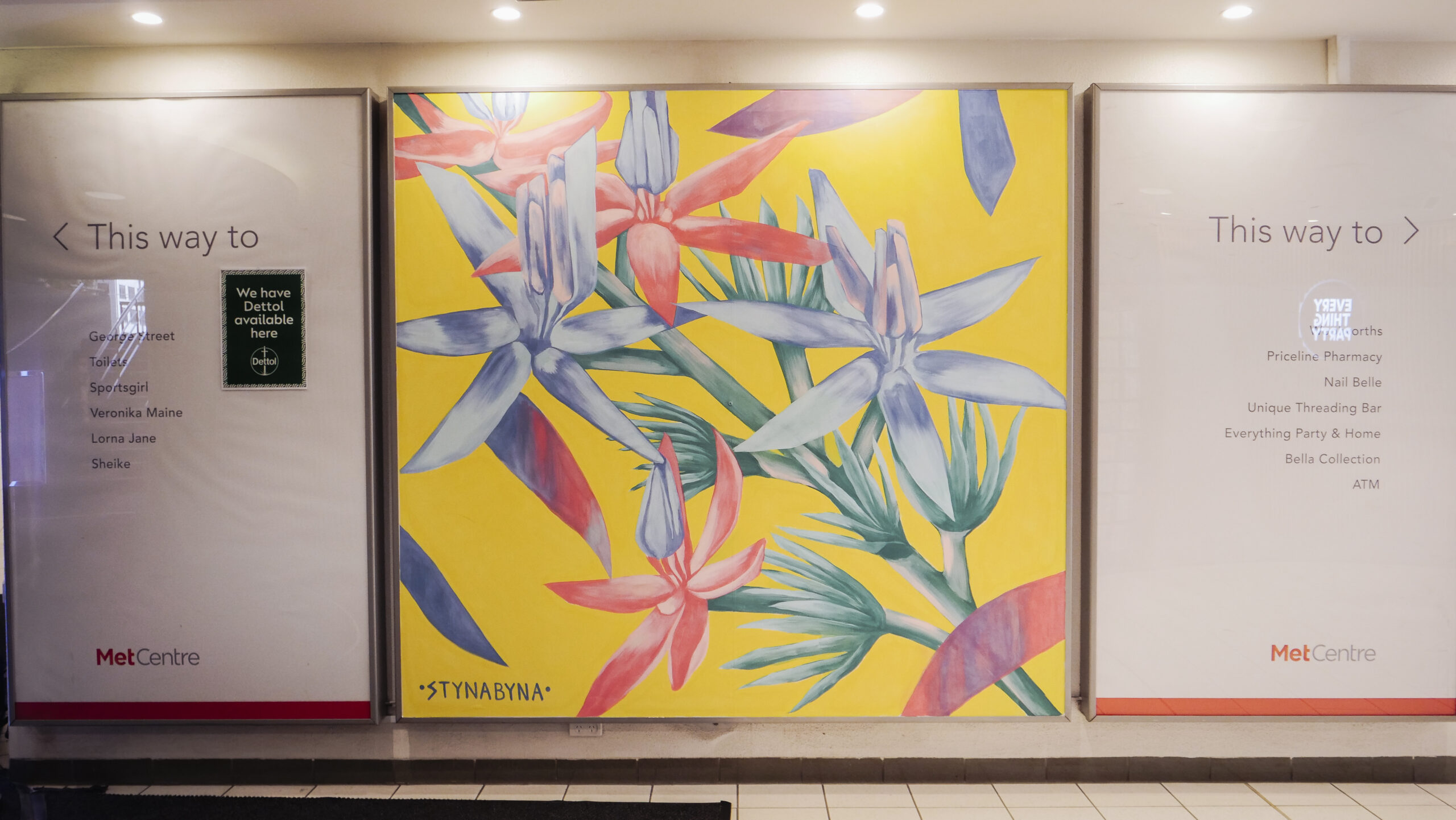 Outdoor geometric multicoloured floral wall mural produced by VANDAL for Mirvac