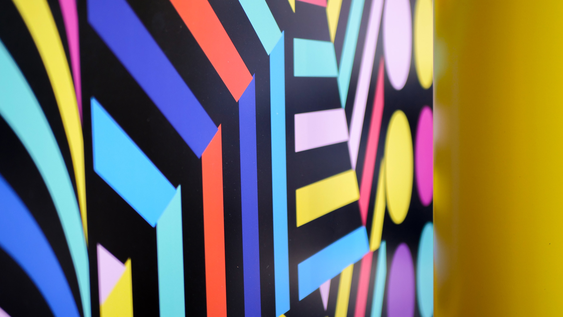 Close up of a multicoloured placemaking artistic mural at World Square - a World of Colour by VANDAL